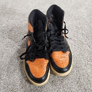Orange and Jordan 1 Black High-Top Sneakers